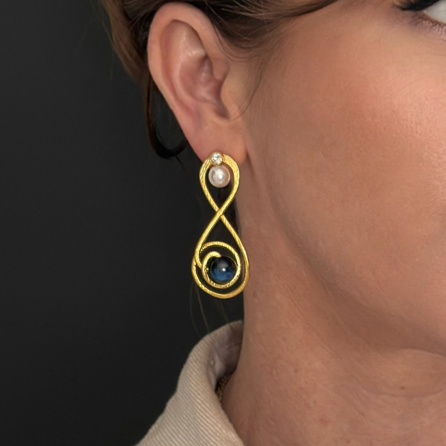 The Artemis II Flight Path Earring Jacket | Liz Fox Roseberry |